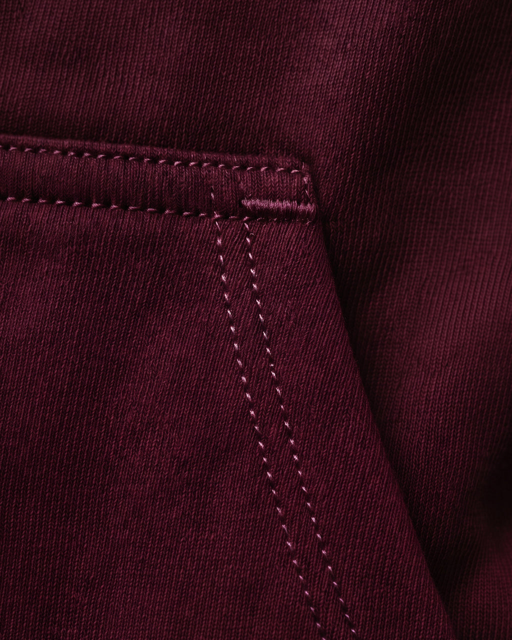 SUTRA wine milton oversized hoodie - pocket stitching close-up