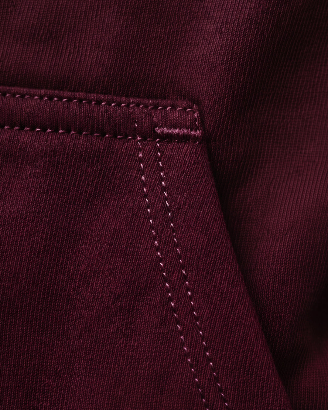SUTRA wine milton oversized hoodie - pocket stitching close-up