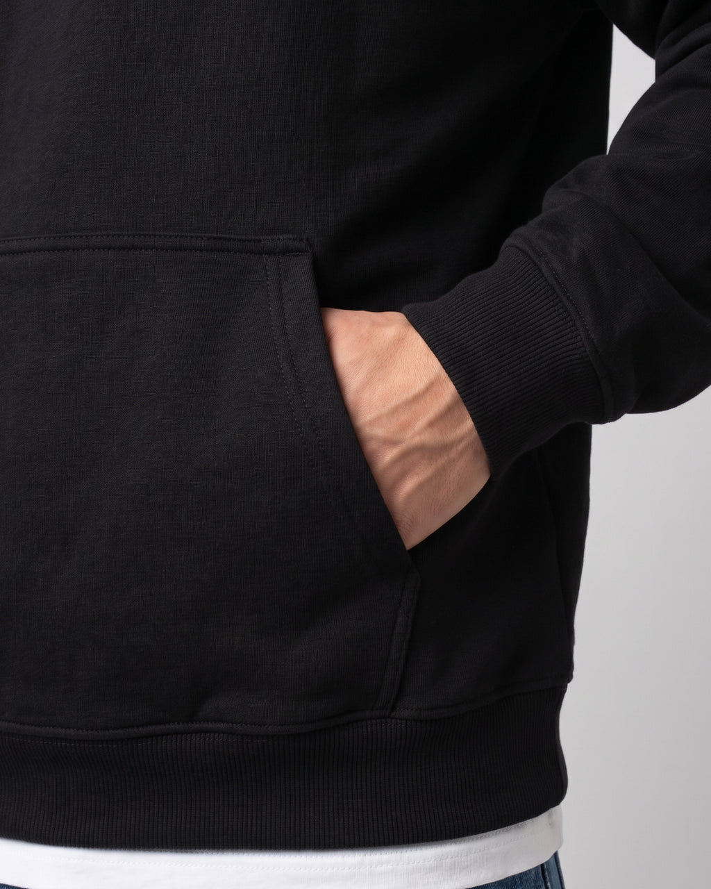 SUTRA black milton oversized hoodie - kangaroo pocket on model