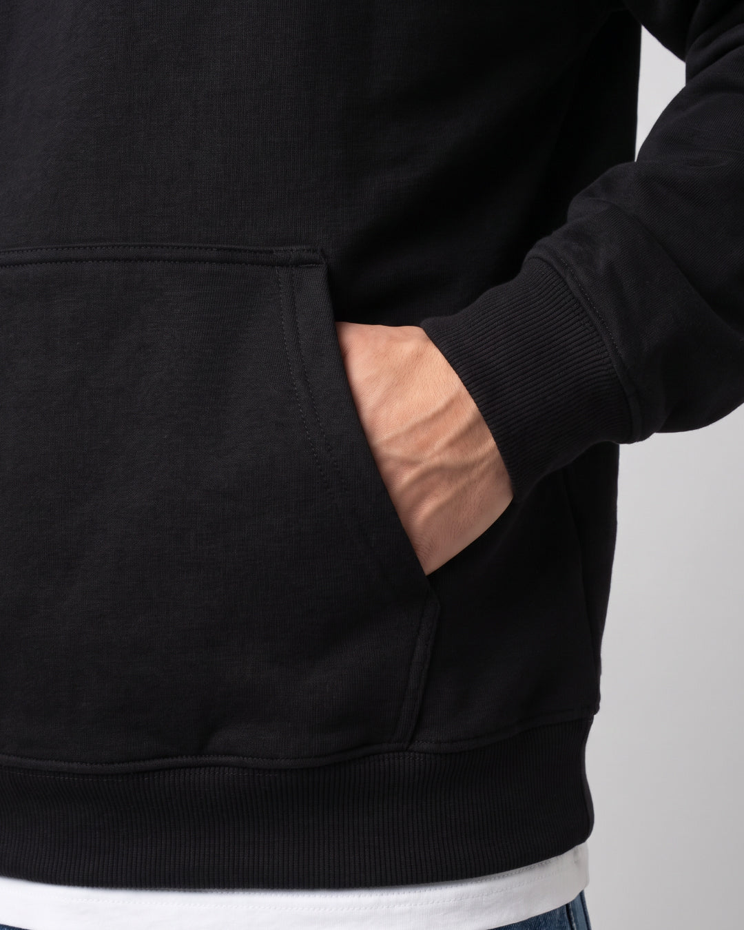 SUTRA black milton oversized hoodie - kangaroo pocket on model