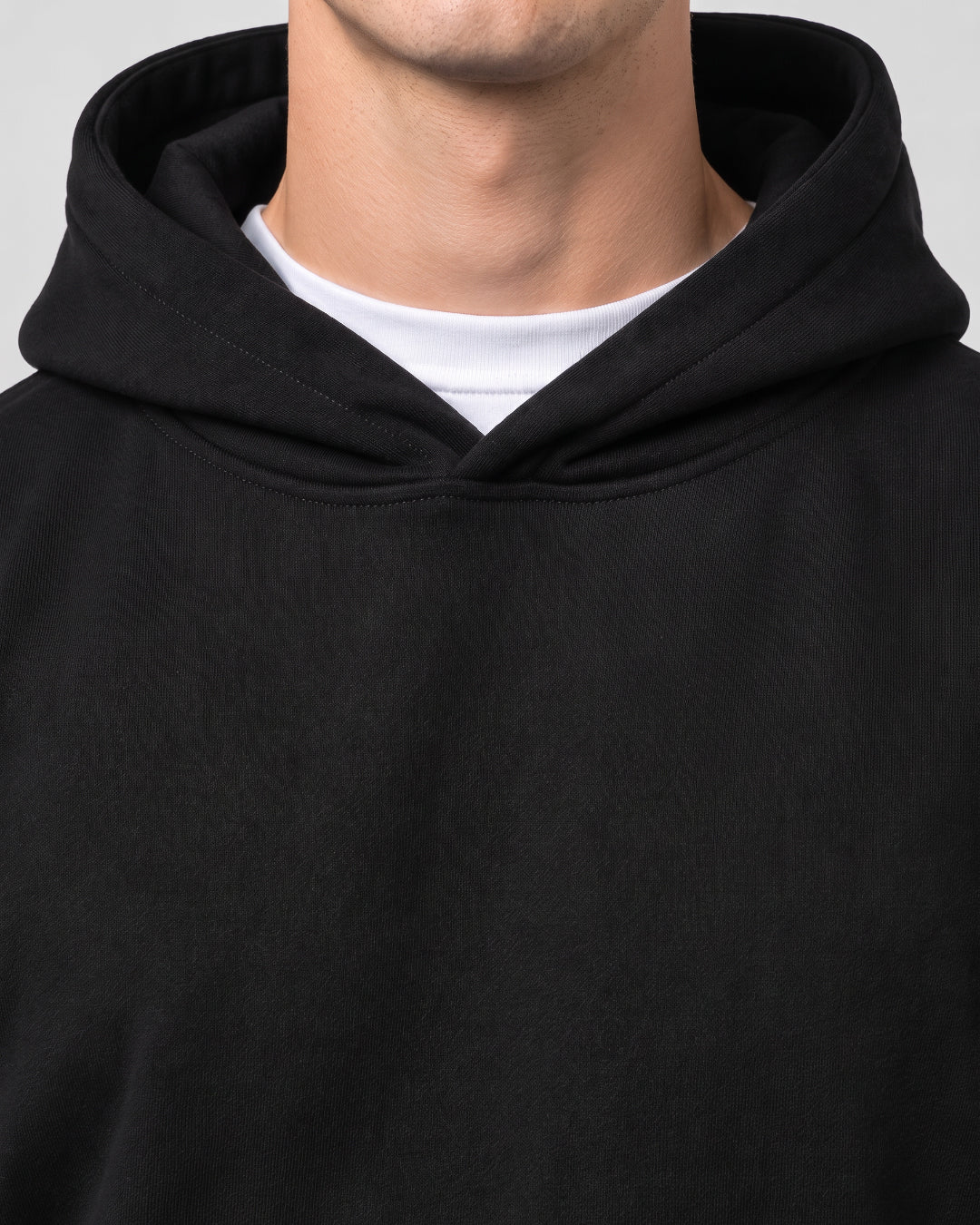 SUTRA black milton oversized hoodie - hood and neckline close-up