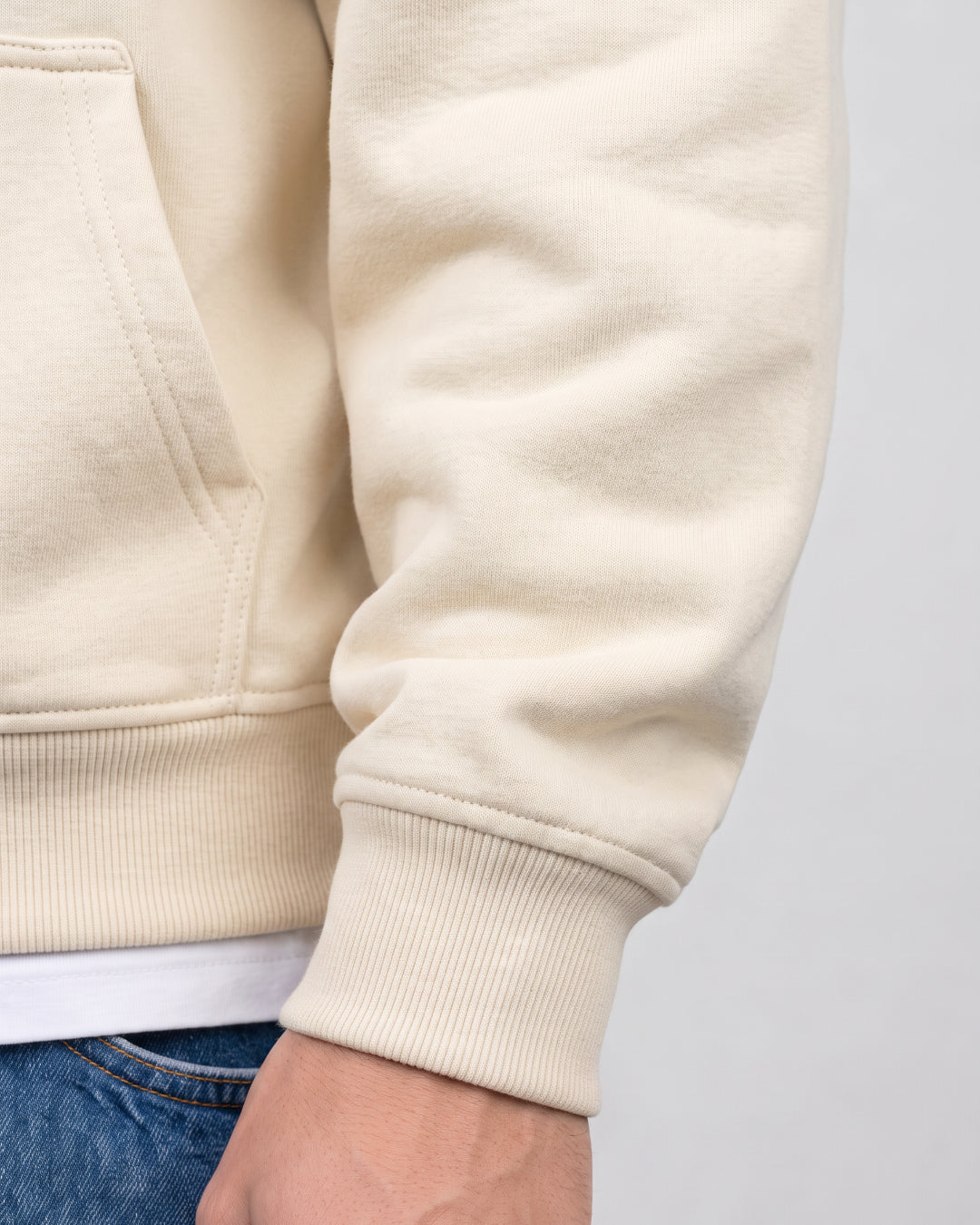 SUTRA beige milton oversized hoodie - ribbed cuff close-up