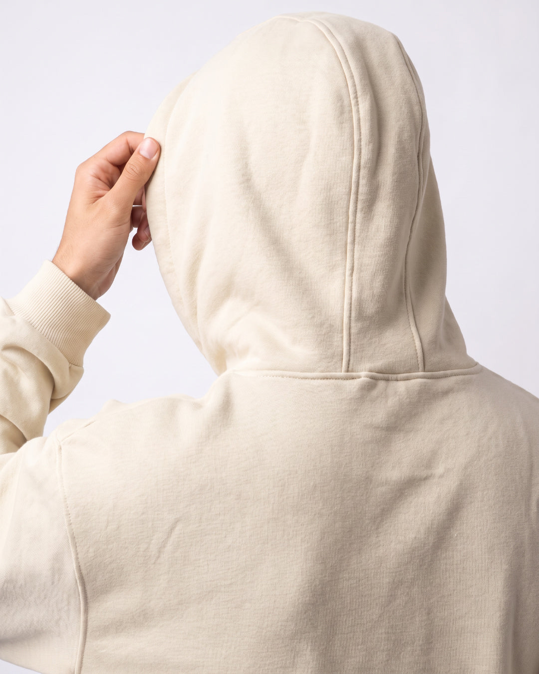 SUTRA beige milton oversized hoodie - hood up on model