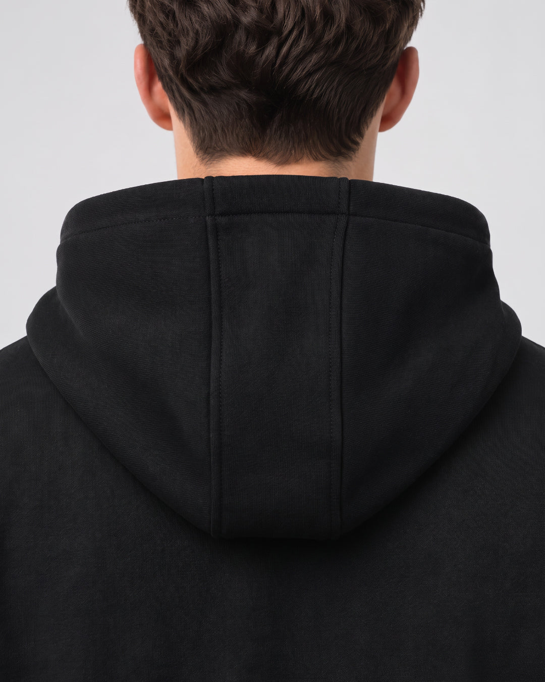 SUTRA black milton oversized hoodie - back view on model